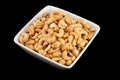 Salted Cashews in a Bowl - Isolated on Black Royalty Free Stock Photo