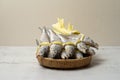 A salted yellow string of dried yellow corvina was placed in a bamboo basket