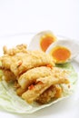 Salted egg with fried fish Royalty Free Stock Photo