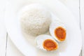 Salted egg served with rice Royalty Free Stock Photo