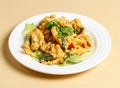 salted egg squid served in dish isolated on background top view singapore food