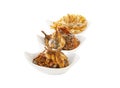 Salted fish fried in ceramic cup Royalty Free Stock Photo