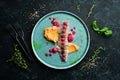 Salted herring fillet with sauce on a plate. Top view. Royalty Free Stock Photo