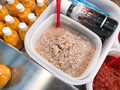 Salted krill meat in plastic tray at Fish Market