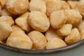 Salted macadamia background close-up Royalty Free Stock Photo