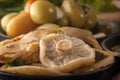 Salted mushrooms on a background of fermented foods on a dark background.