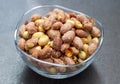 Salted peanuts in a glass bowl. Royalty Free Stock Photo