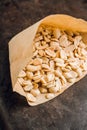 Salted peanuts on rustic background