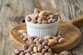 Salted peanuts on wood floor. bulk peanut kernels Royalty Free Stock Photo