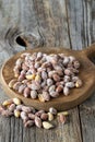 Salted peanuts on wood floor. bulk peanut kernels Royalty Free Stock Photo