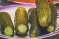 Salted pickled cucumbers on a plate