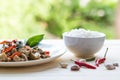 Salted pork with chili & Basil leaves in plate and rice Royalty Free Stock Photo