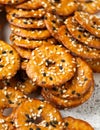 Salted Pretzel thins with black white sesame seeds Royalty Free Stock Photo