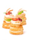 Salted puff pastry stuffed with cream cheese and prawns on white