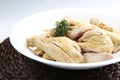 Salted raw chopped boile dchicken on white dish