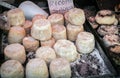 Salted Ricotta cheese on market stall