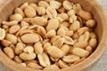 Salted roasted peanuts in bamboo bowl Royalty Free Stock Photo