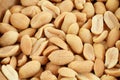 Salted roasted peanuts in bamboo bowl. Closeup. Day light Royalty Free Stock Photo