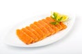 Salted salmon with butter and lemon. Plate on a white background