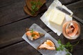 Salted salmon fillets with sea salt and butter on rye bread. Royalty Free Stock Photo