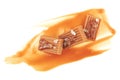 Salted toffee candies with caramel sauce isolated on white background. Golden Butterscotch toffee caramels