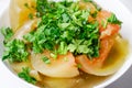 Salted tomato with chopped parsley, healty food