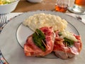 Saltimbocca with Risotto on plate. table setting, restaurant Royalty Free Stock Photo