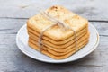 Saltine crackers on a plate on white table Royalty Free Stock Photo