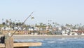 Saltwater angling on pier, fishing tackle or gear. California USA. Sea ocean water, rod or spinning. Royalty Free Stock Photo