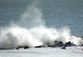 Crashing ocean waves on rocks with detailed sea spray Royalty Free Stock Photo