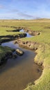 Saltwater tidal channel in scenic landscape in Sylt