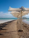 Salty beach at Ein Bokek Dead Sea Resort, Israel Royalty Free Stock Photo