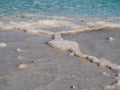 Salty beach at Ein Bokek Dead Sea Resort, Israel Royalty Free Stock Photo