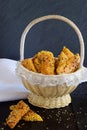 Salty biscuits with sesame seeds in a basket Royalty Free Stock Photo