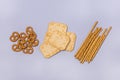 Salty Crackers Sticks Pretzels Top View Above Blue Background Party Snacks Mix Variety of Tasty Crackers for Beer Flat Lay Royalty Free Stock Photo