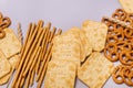 Salty Crackers Sticks Pretzels Top View Above Blue Background Party Snacks Mix Variety of Tasty Crackers for Beer Flat Lay Royalty Free Stock Photo