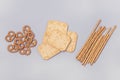 Salty Crackers Sticks Pretzels Top View Above Blue Background Party Snacks Mix Variety of Tasty Crackers for Beer Flat Lay Toned Royalty Free Stock Photo