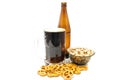 Salty pretzels and pistachios with beer Royalty Free Stock Photo