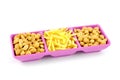 Salty snack in purple bowl Royalty Free Stock Photo