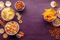 Salty snacks, overhead flat lay background with copy space. Party food frame Royalty Free Stock Photo