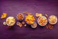 Salty snacks, overhead flat lay background with copy space. Party food Royalty Free Stock Photo