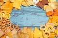 Salty snacks. Pretzels, chips, crackers on wooden background. Unhealthy products Royalty Free Stock Photo