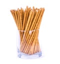 Salty sticks standing in a glass isolated