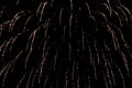 Salute, fireworks in the night sky. Pyrotechnic show on a holiday. Explosion of many firecrackers