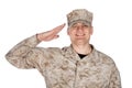 Saluting and smiling army soldier studio shoot Royalty Free Stock Photo