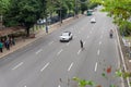 Salvador, Bahia, Brazil - August 11, 2023: Pedestrian is seen risking his life crossing the busy lanes of Avenida Tancredo Neves
