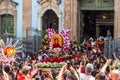 Crowd of Catholics saluting the image of Santa Barbara leaving the church Royalty Free Stock Photo