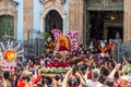 Crowd of Catholics saluting the image of Santa Barbara leaving the church Royalty Free Stock Photo