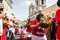 Devotees of Santa Barbara attend mass in front of Rosario dos Pretos church