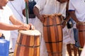 candomble members are playing percussion instruments during the party for yemanja